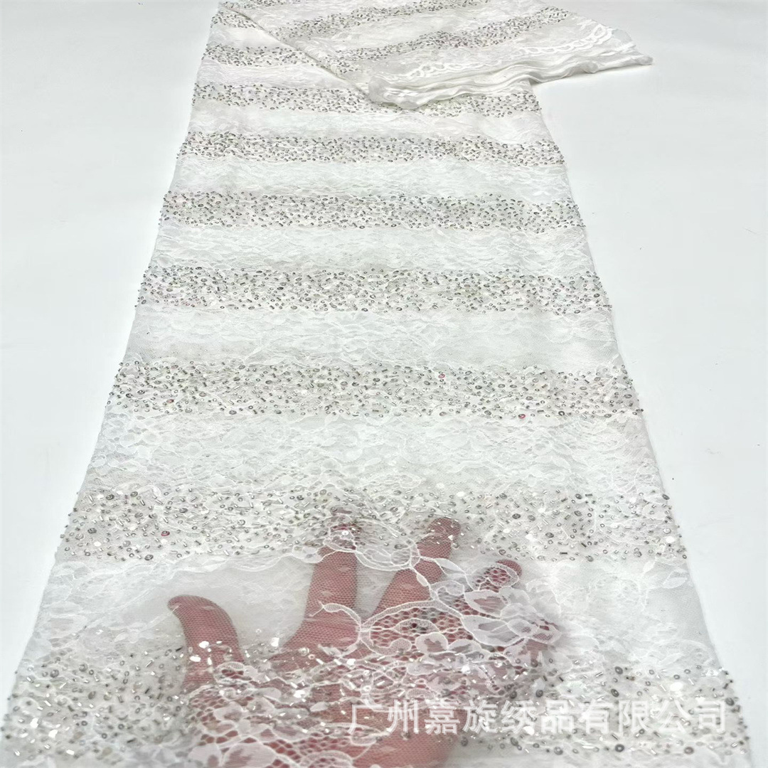 Tela africana de encaje con cuentas y bordados para vestidos y trajes de novia.
