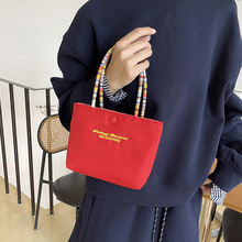 韩系复古刺绣字母手提包2025新款便携彩绳撞色帆布包潮个性手挽包