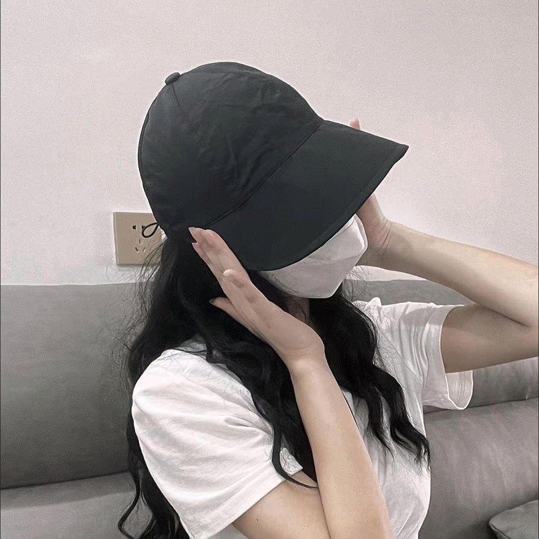 Los niños del sombrero de pescador de primavera Zhao Lusi tienen la misma cara con una cabeza grande y aleros anchos pequeños, se pueden colgar máscaras y gorras de protección solar