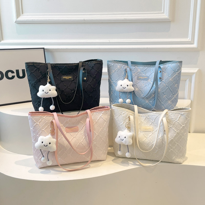 Tendencia transfronteriza coreana bolso de mano bolso de mujer 2025, nuevo otoño bolso de hombro de aire extranjero a rejilla bolso de brazo de viaje