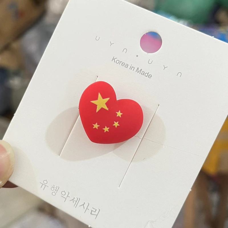 国慶節の頭飾りの赤い髪ひもの子供の皮筋は赤ちゃんの国旗のヘアピンのヘアゴムの髪ひもを傷つけない|undefined