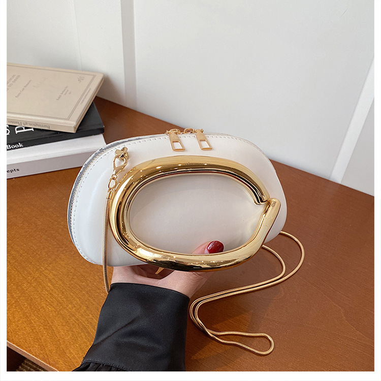 Bolsa de alta sensación para mujeres 2026 primavera nueva bolsa de brazo de viaje de moda simple nicho de diseño de hombro mochila