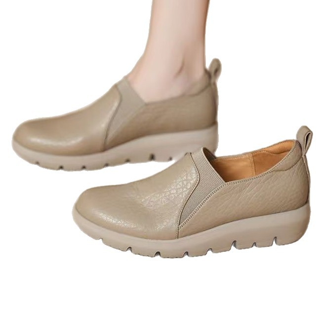 Zapatos de cuero suave redondos de boca superficial para mujeres 2026 primavera y verano nuevos zapatos de madre planos con suela suave ligera y cómoda zapatos de soja