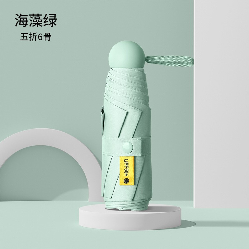 Cincuenta plegables mini cápsula soleado y lluvia para mujeres paraguas de sol de bolsillo de vinilo ultraligero compacto y portátil