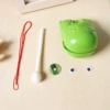 Put a 2 -inch wooden fish green with a stick (send eyes, safe buckle, red rope)