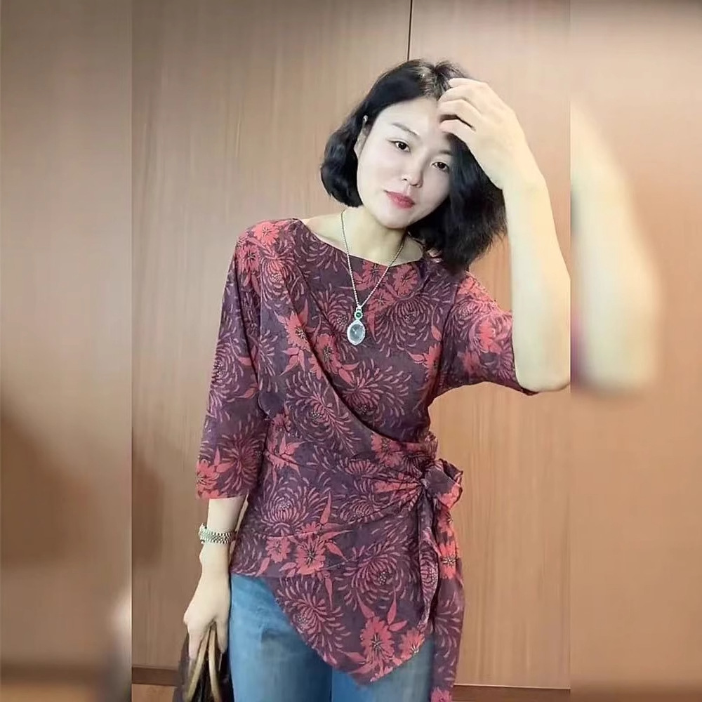 欧洲站欧货洋气斜肩下摆不规则绑带别致上衣长袖印花百搭小衫2025