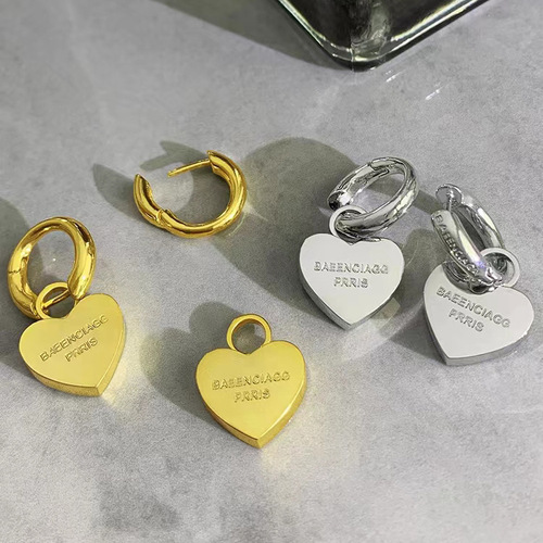 French light luxury Chanel-style 14K brass heart-shaped metal earrings, niche high-quality accessory wholesale