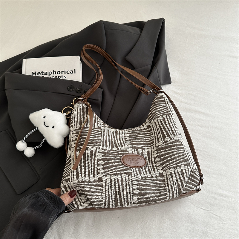 Bolso de lona para mujeres 2024 nuevo otoño bolso universitario de doble propósito mochila de hombro de viaje universal mochila de hombro