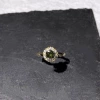 Olive green round diamond ring