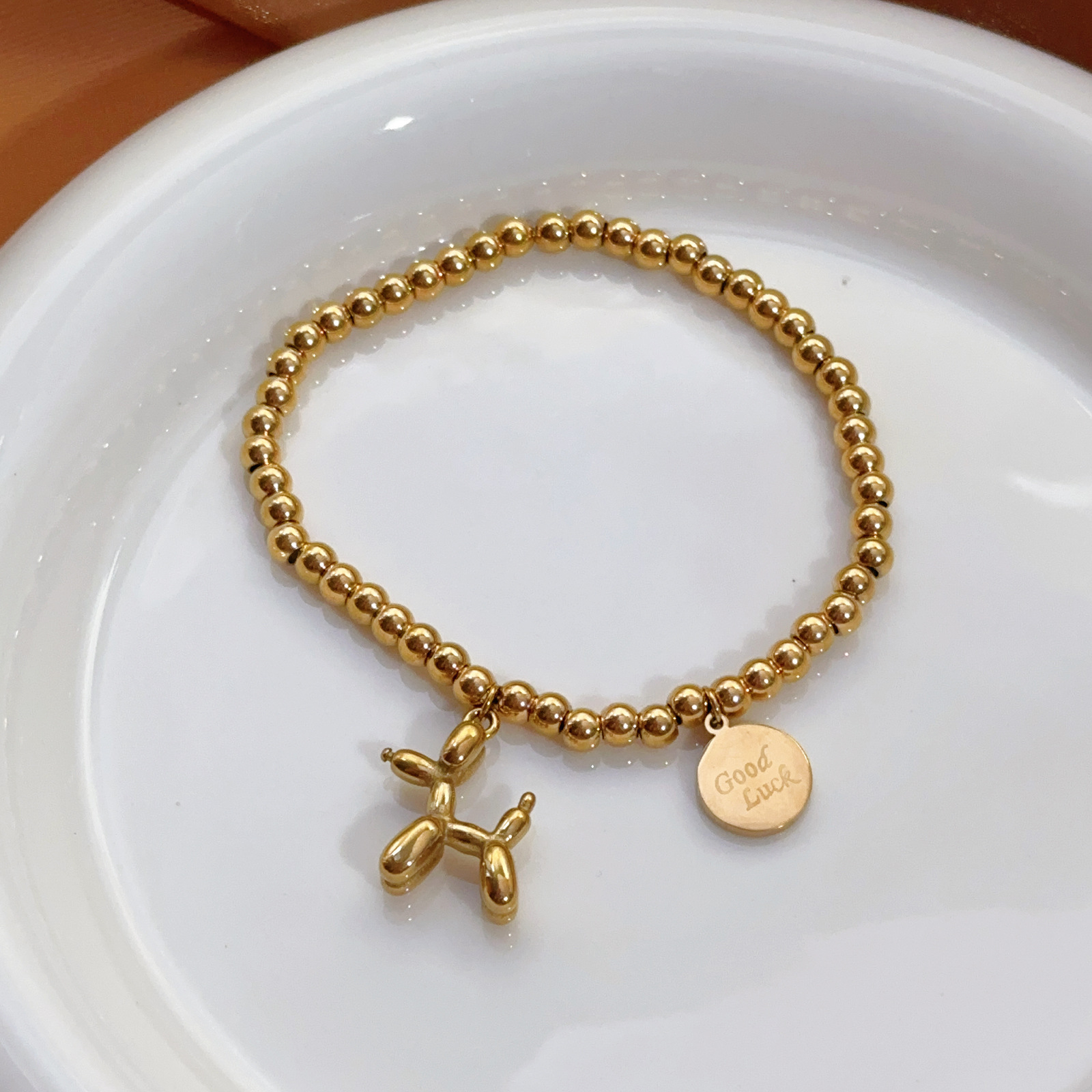 Estilo coreano ins lindo aire cachorro pulsera collar salvaje mujer 18k oro transfronterizo titanio acero joyería no desvanece luz de lujo
