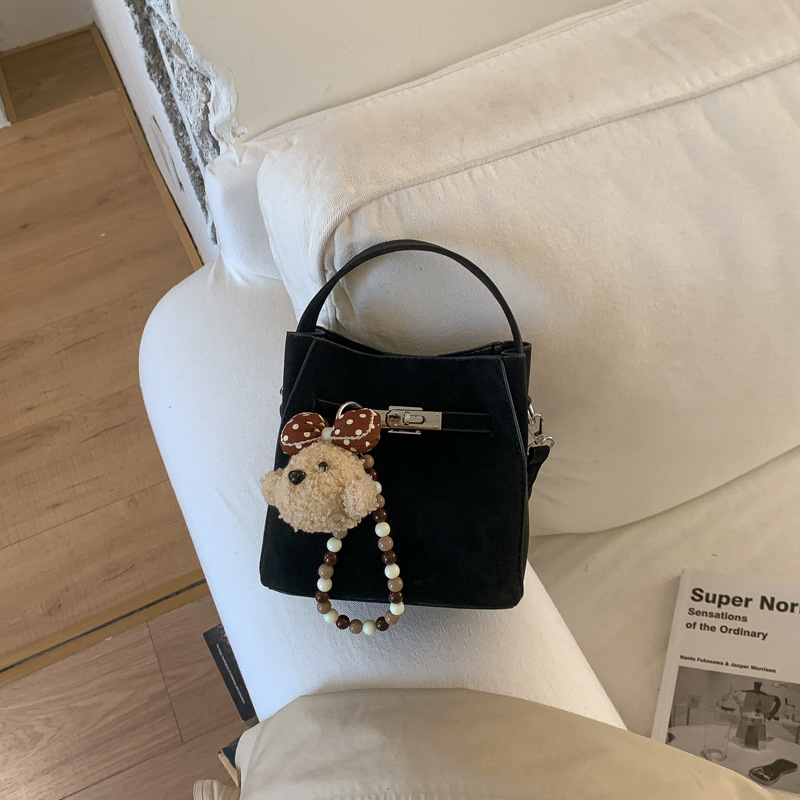 Cross-border 2026 nuevo estilo coreano nicho Zhong bolso de cubo de agua super caliente mujer de viaje universal temperamento casual mochila diaria