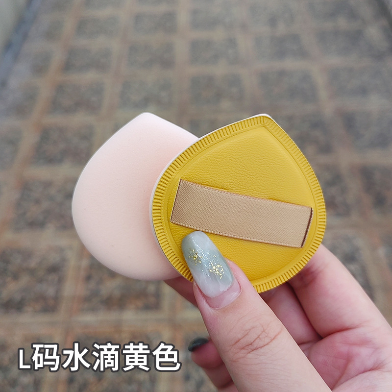 100分パフの木の大きいサイズのマシュマロのパフの空気感の乾湿の両用の粉の底液はエアクッションのパフを使います。|undefined