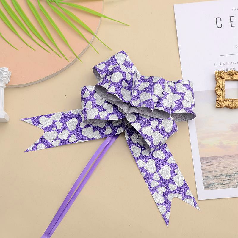 Comercio exterior transfronterizo 50 arco de impresión brillo flor tirada a mano regalo de Navidad embalaje de flores flash diamante tire flor cinta