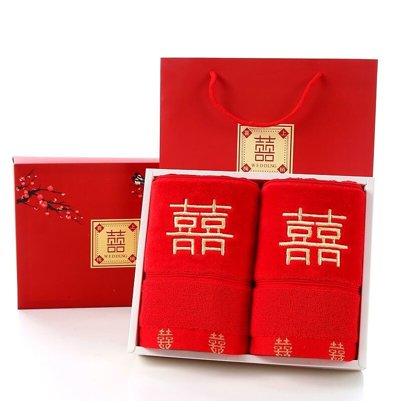 A pair of pure cotton red wedding towels, packaged in a gift box, perfect as a wedding gift or return gift, featuring a vibrant red color that won't fade, manufactured in a factory for cross-border sales A pair of pure cotton red wedding towels, packaged in a gift box, perfect as a wedding gift or return gift, featuring a vibrant red color that won't fade, manufactured in a factory for cross-border sales
