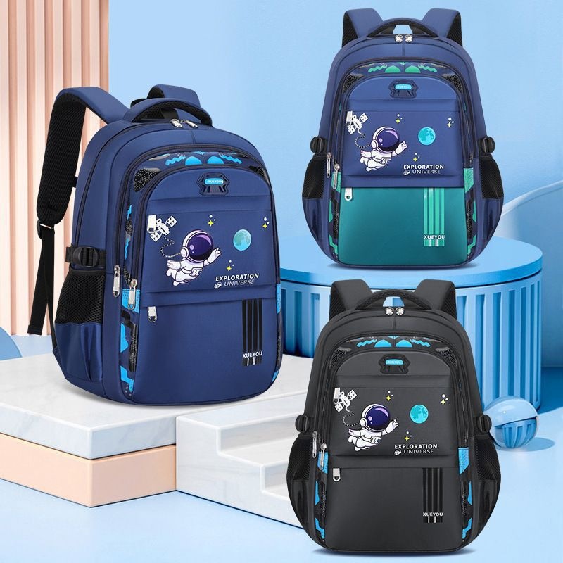 Mochila de impresión impermeable para niños astronautas espaciales para estudiantes de primaria para reducir la carga de la cresta de gran capacidad mochila anti-jorobas