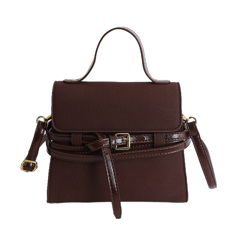 Bolsas de mano de nicho coreano de color contraste para mujeres 2026 primavera textura simple moda diaria correa de hombro mochila