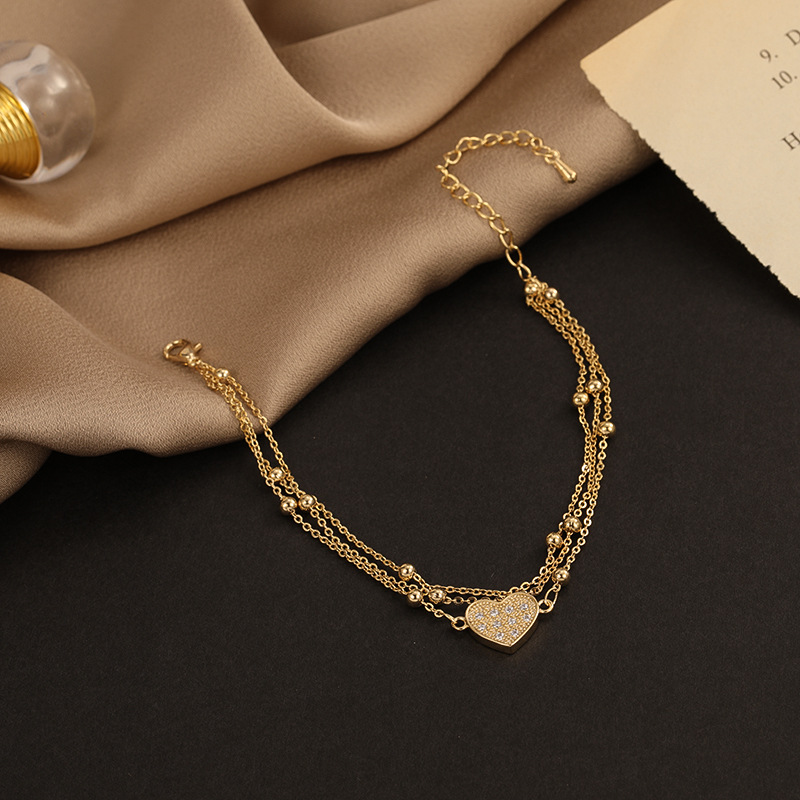新款时尚三层定位珠链钛钢手链女满钻爱心形手环简约不锈钢饰品