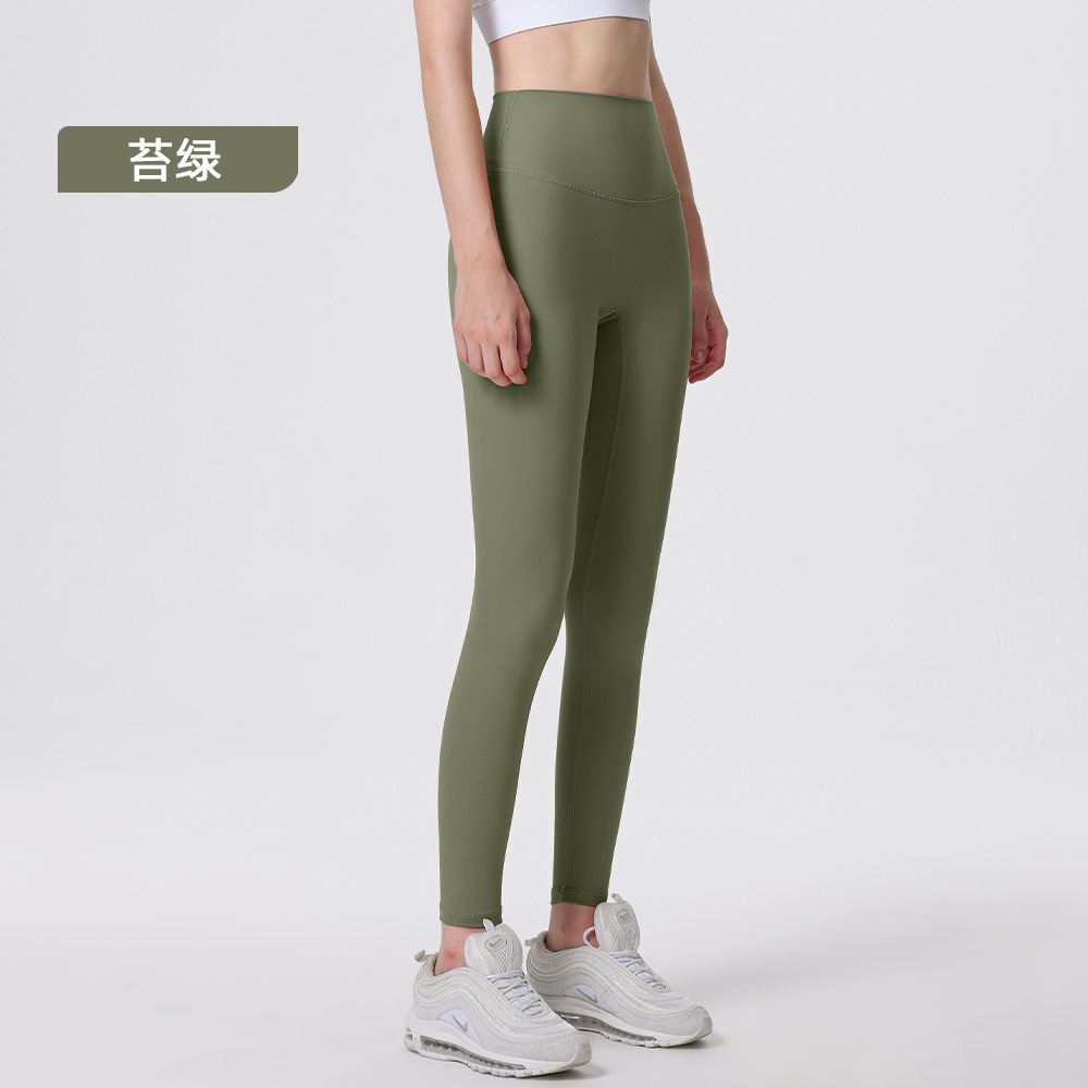 Nuevos deportes de yoga cintura alta desnuda sensación de no vergüenza línea piel-friendly levantamiento de la cadera del vientre que no se contrae la caída de la aptitud de las mujeres pantalones recortados