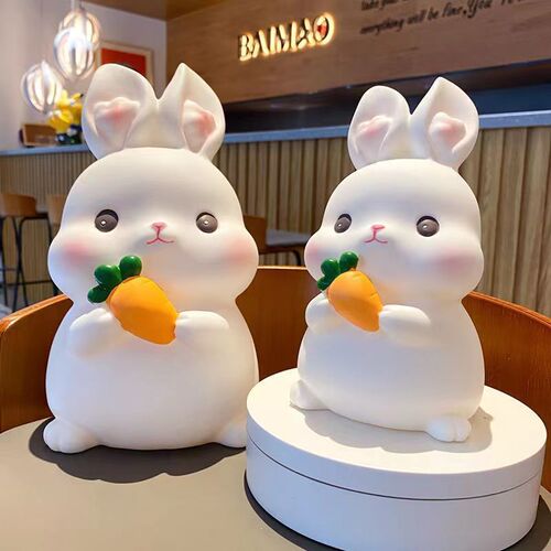 The little rabbit piggy bank can only go in and out.  new model can not be broken. Zodiac rabbit piggy bank birthday gift for boys and girls.