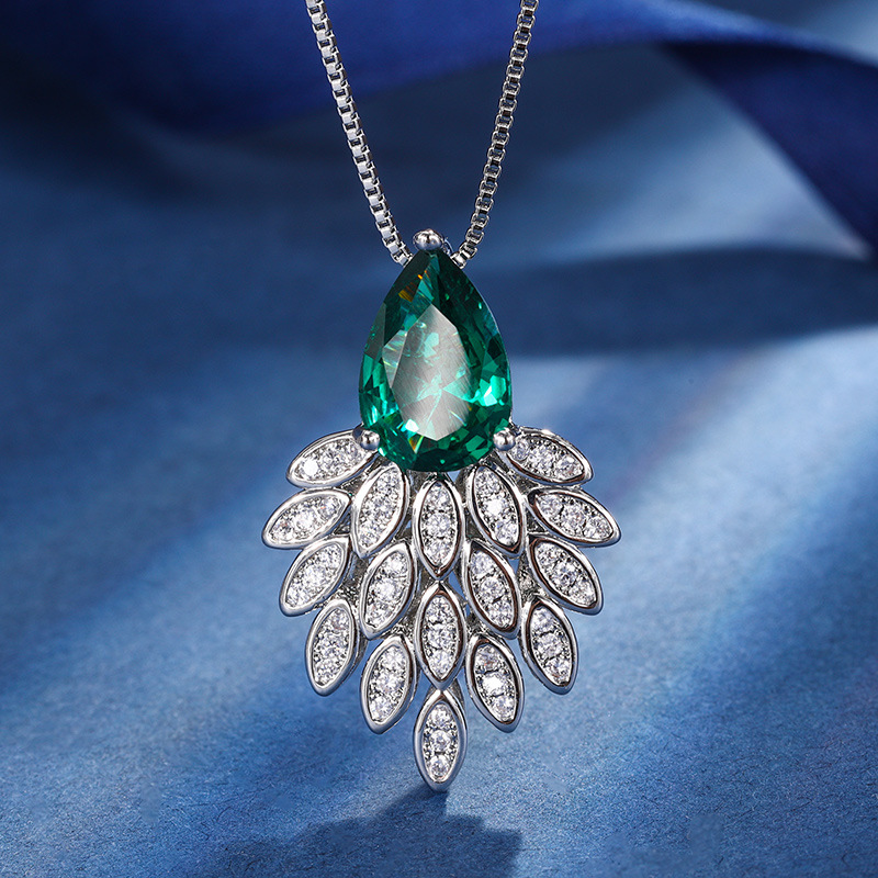 2024 nuevo estilo Zhuang Sheng joyería cobre inferior chapado en oro moda simulación color tesoro corindón temperamento colgante traje femenino 8*12