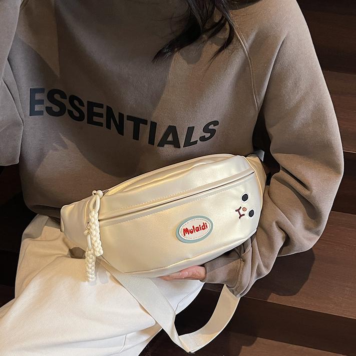 Riñonera casual simple de comercio exterior para mujer 2025 nuevo estilo coreano bolso de hombro de viajero súper caliente bolso de pecho de mensajero