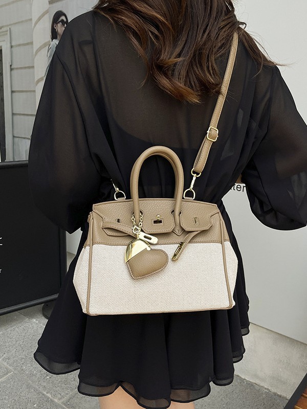 Bolso de tela de mujer color contrastante empalme bolso portátil Kylie bolsa de gran capacidad transfronteriza alta sensación de viaje bolsa de mano