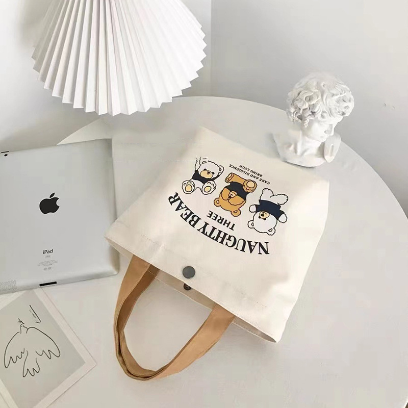 Bolsa de lona bolso de las mujeres nuevo estudiante almuerzo bolsa de trabajo simple fuera pequeña bolsa de gran capacidad bolso de la momia