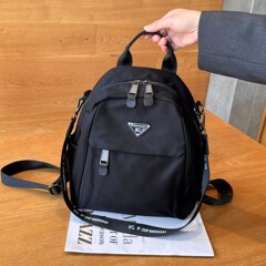 高級な質感の小さいリュックサックの女性2025新型ファッションカジュアルオックスフォード布防水小型リュックサック旅行は軽いです。