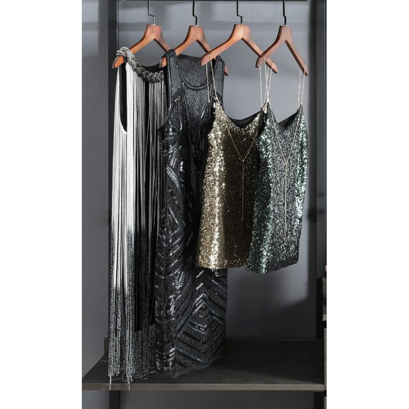 Sala de modelo verde sala de vestuario vestuario moderno simple mesa de maquillaje combinación de decoración caja de almacenamiento de vestido de cena