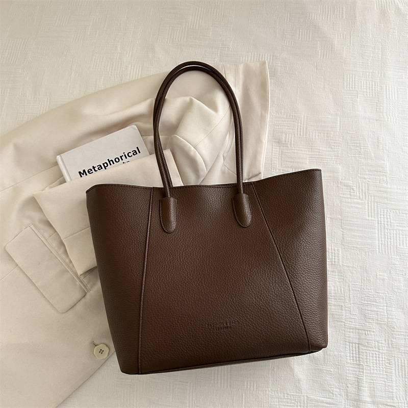 2024 nueva moda de color sólido ocio de viaje sencillo bolso de hombro para mujeres gran capacidad suave retro mujer