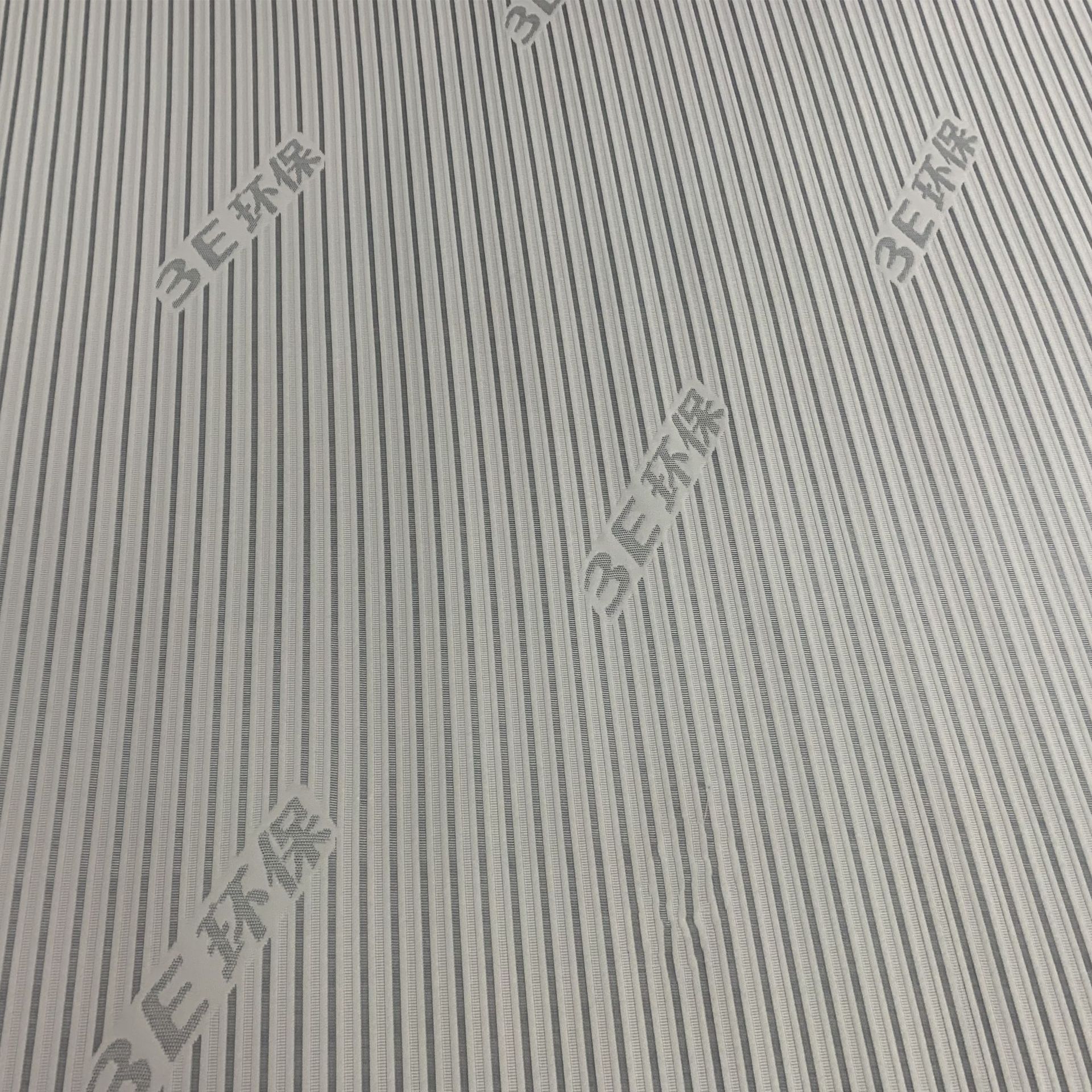 180 gramos 3E tejido Jacquard tela rayada gris claro tela de colchón se puede agregar tela de poliéster tela de colchón se puede personalizar