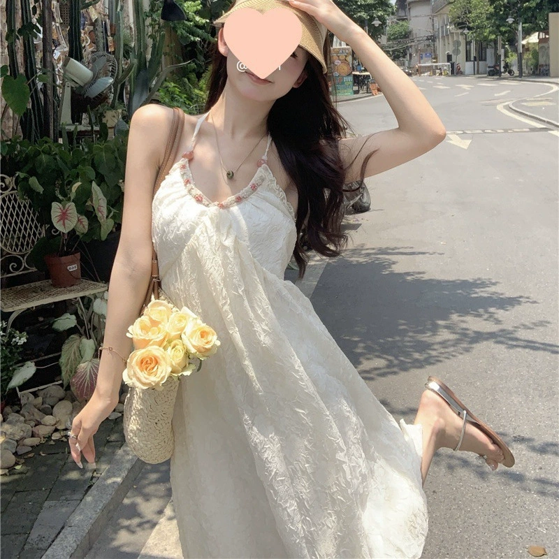 纯欲风挂脖雪纺连衣裙女夏季海边度假法式露背裙子设计感白色长裙