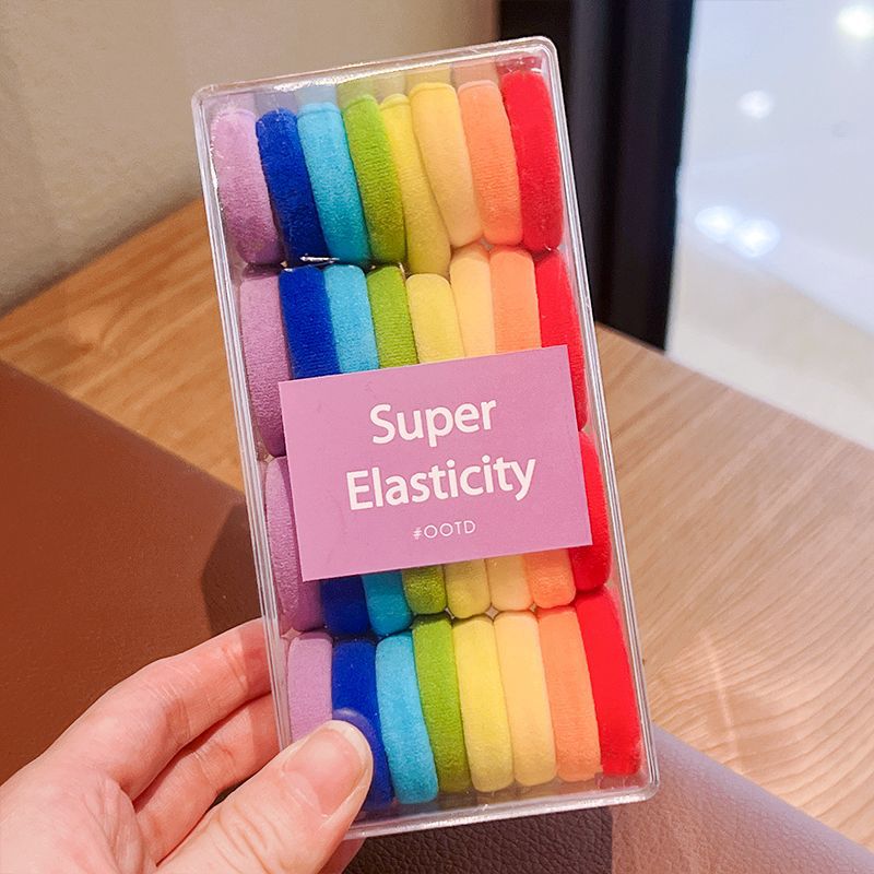 Círculo de pelo de color arcoíris 32 cajas