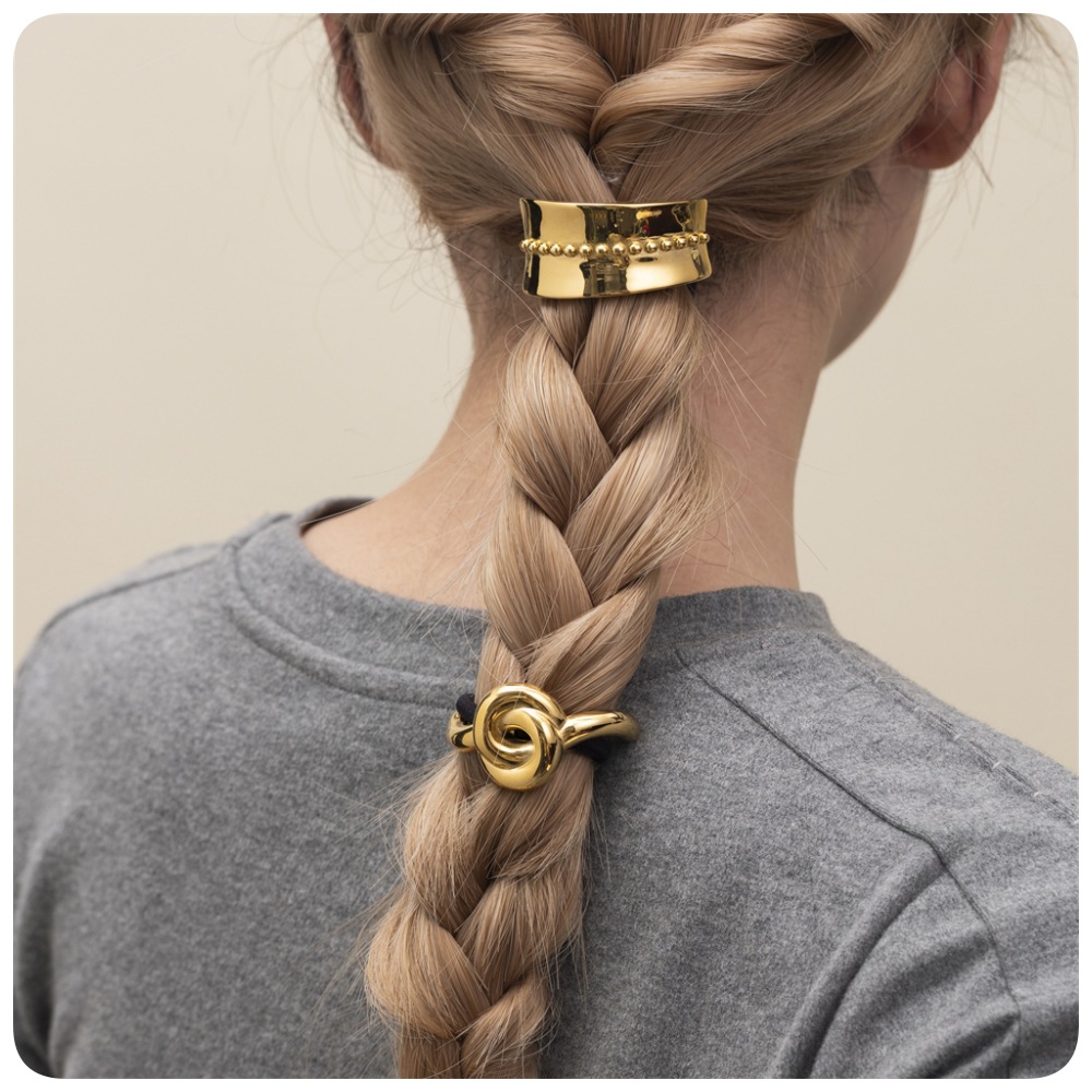 TENA Europa y América caliente estilo de acero inoxidable de oro 18K temperamento simple cuerda de cabello trenzada de cabello de cola de caballo