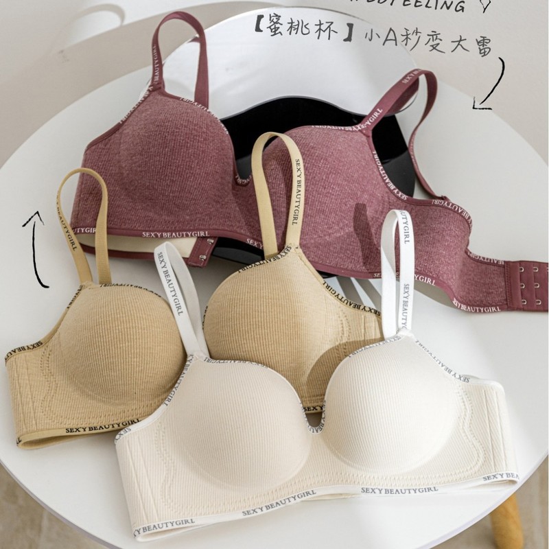 胸が小さい女性向けの厚いカップのシームレスなガールズプッシュアップブラジャー、女性用ノンワイヤー拡大コミックブラジャー|undefined