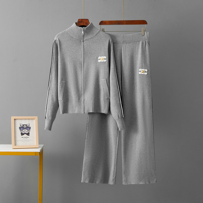 クロスボーダーのスポーツスーツの女性の春秋の服の新型のファッション的な洋風のファスナーの立襟の衛服のスポーツ服のカジュアルな2つのセット