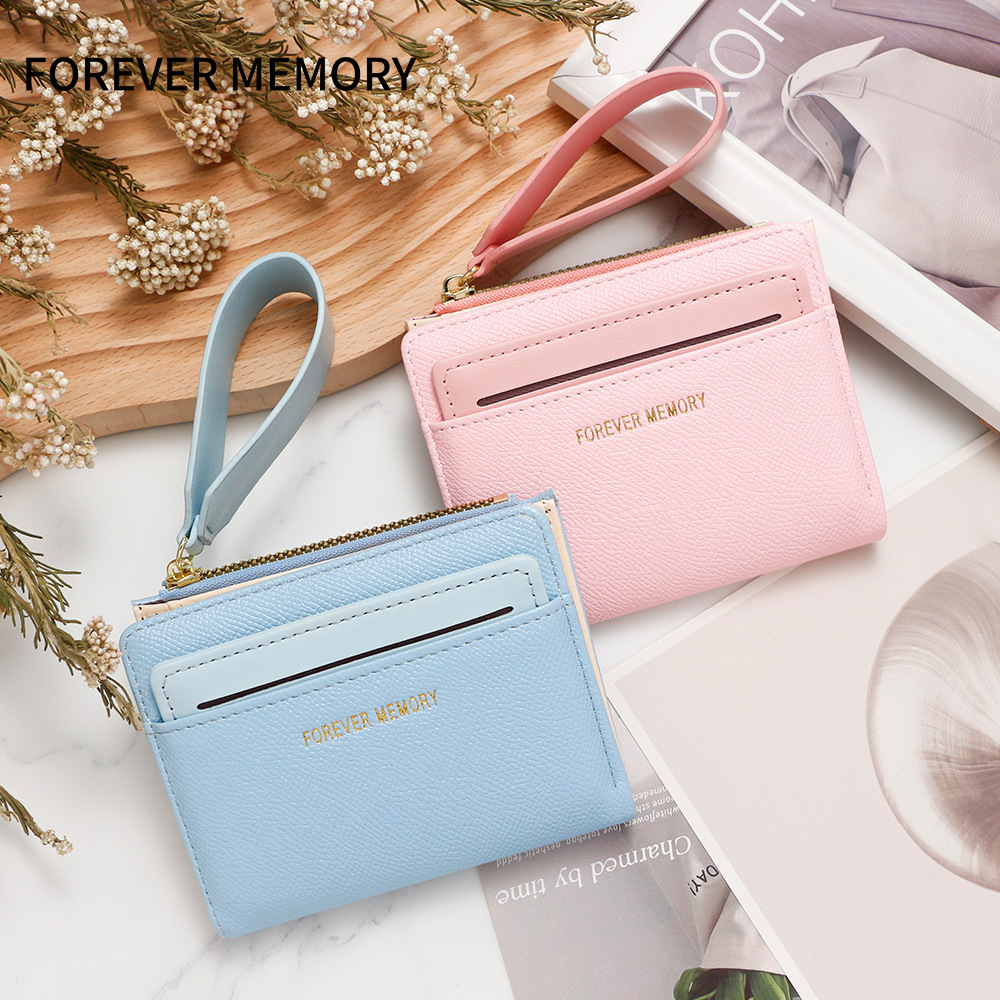 Nueva billetera corta de mujer fresca y simple doble cremallera bolso de cambio multi-tarjeta bolso multifuncional