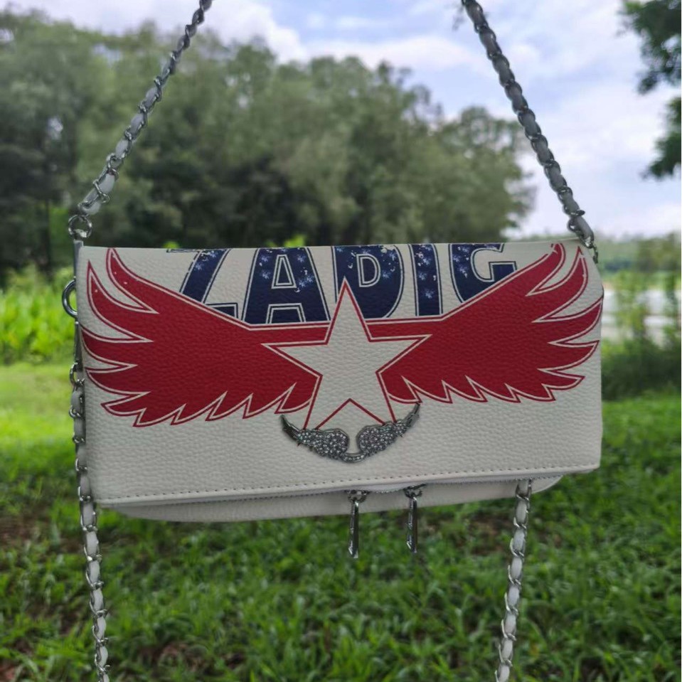 zv transfronterizo impresión inglesa damas de cuero PU cremallera larga multi-tarjeta de mano para llevar dinero brazo de ala taladro caliente