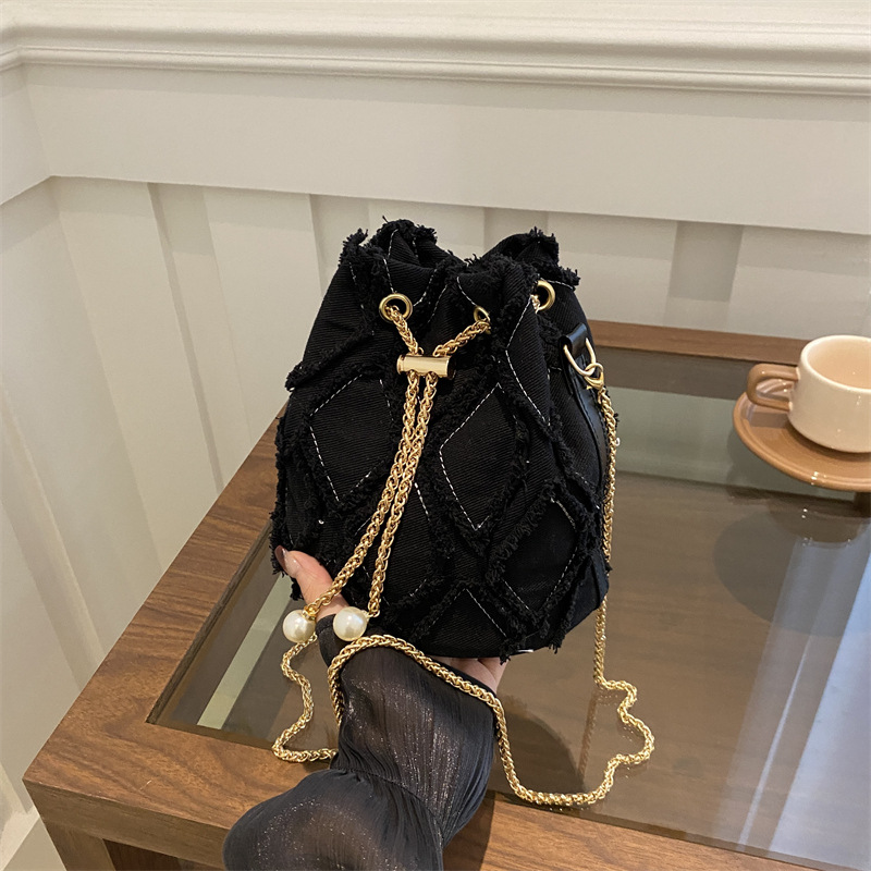 Nicho de diseño bolso de cubo otoño 2024 nuevo bolso de cordón de dibujo bolso de mujer mochila de moda simple bolso de hombro