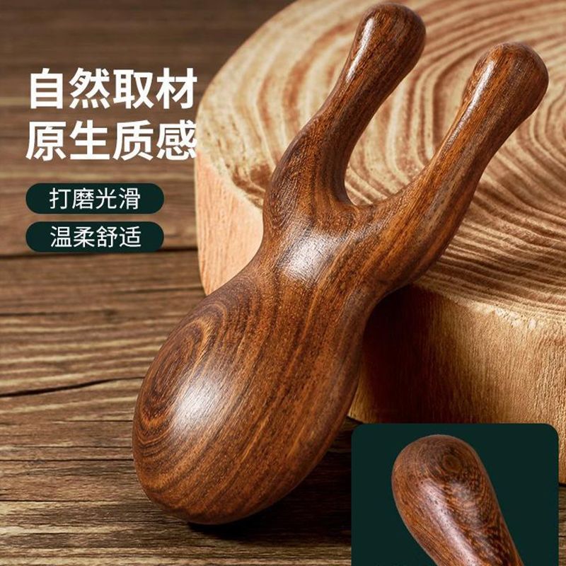 檀木マッサージの目の周りのカエルマッサージ器は耳の神器をこすります。|undefined