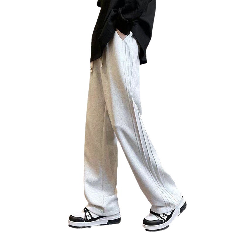 Otoño y invierno nuevo estilo de tendencia pesada para hombres pantalones de calzado de pierna sueltos y versátiles rectos con lana casuales