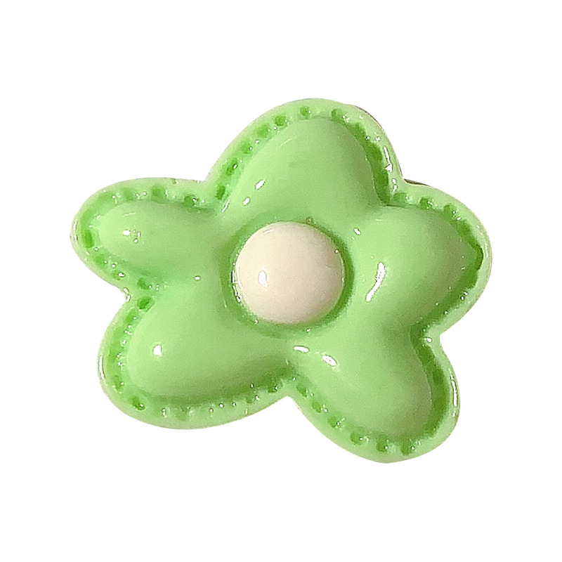 Pequeño tamaño diy flor de dopamina accesorios de resina crema para el cabello taza de agua pegada agujero zapatos colgantes hechos a mano al por mayor