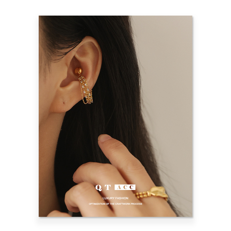 Latón chapado 18K oro real diseño temperamento earless pendientes al por mayor vintage ZIRCON borla oído clip de hueso para las mujeres