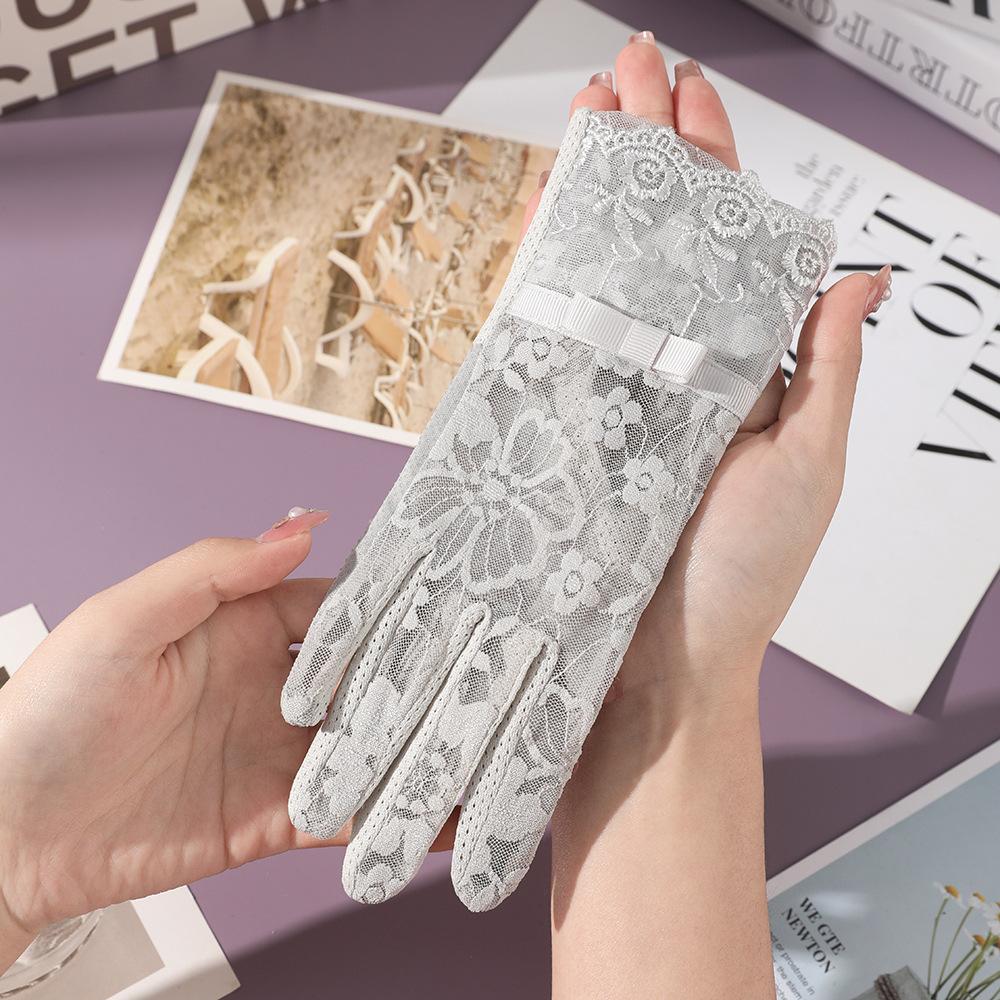 Nuevos guantes de protección solar para mujer primavera y verano al aire libre pantalla táctil encaje antideslizante arco fábrica al por mayor