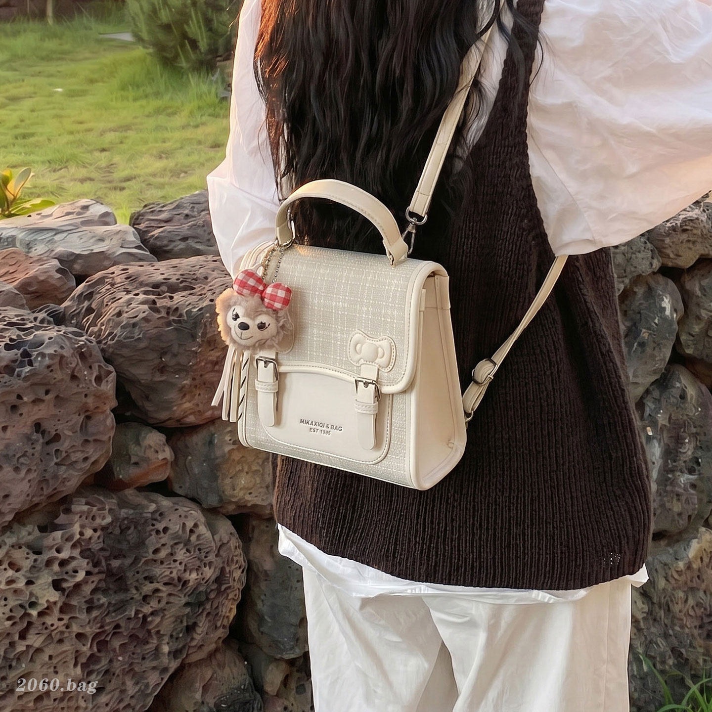 Mochila universitaria popular para estudiantes mochila casual de mujer estilo a cuadrícula nicho 2026 escuela de moda de verano nuevo estilo