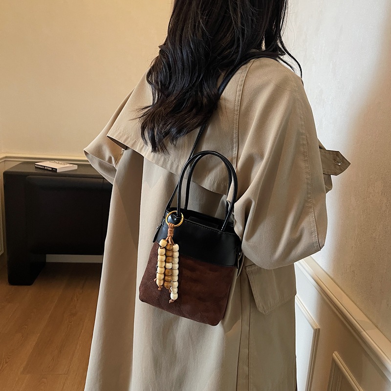 Bolsa de cubo de mano mate transfronteriza bolsa de teléfono móvil de gamuza mujeres otoño y invierno 2025 nuevo estilo de alta calidad bolso de hombro