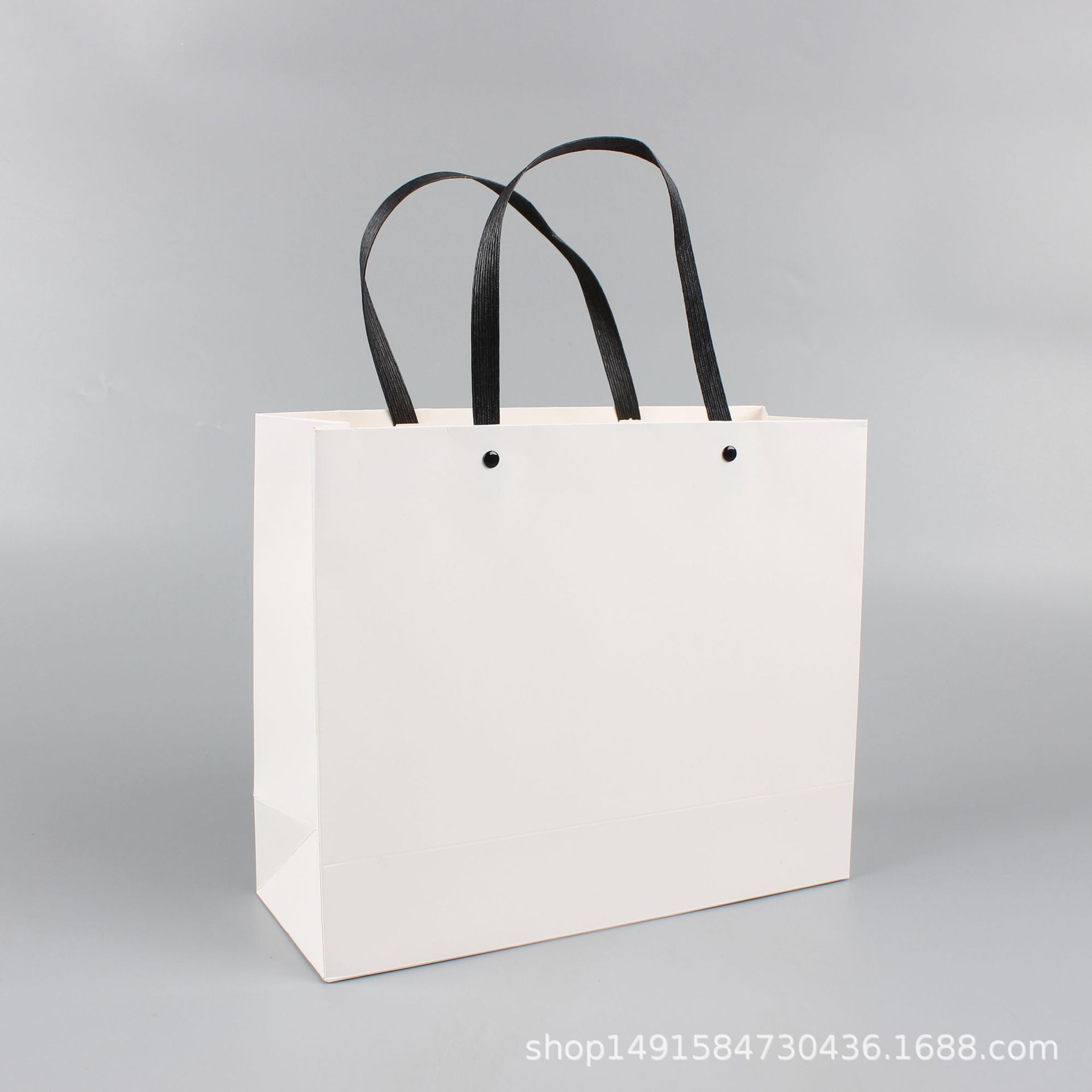 Artistic simple personality gift packaging bag cosmetics shopping clothing handbag paper bag fashion gift bag wholesale