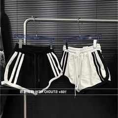 つなぎ合わせの色のひものストライプの半ズボンの女性の夏の新型の運動のa字の緩みの高い腰の広い足のカジュアルな熱いズボン
