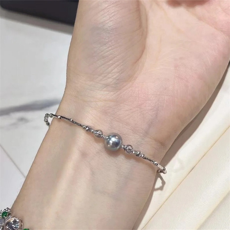 패션 클래식 18K 바닷물 정말 대마 파인애플 볼 팔찌 8-8.5MM 라운드 강한 빛 거의 완벽한 여성