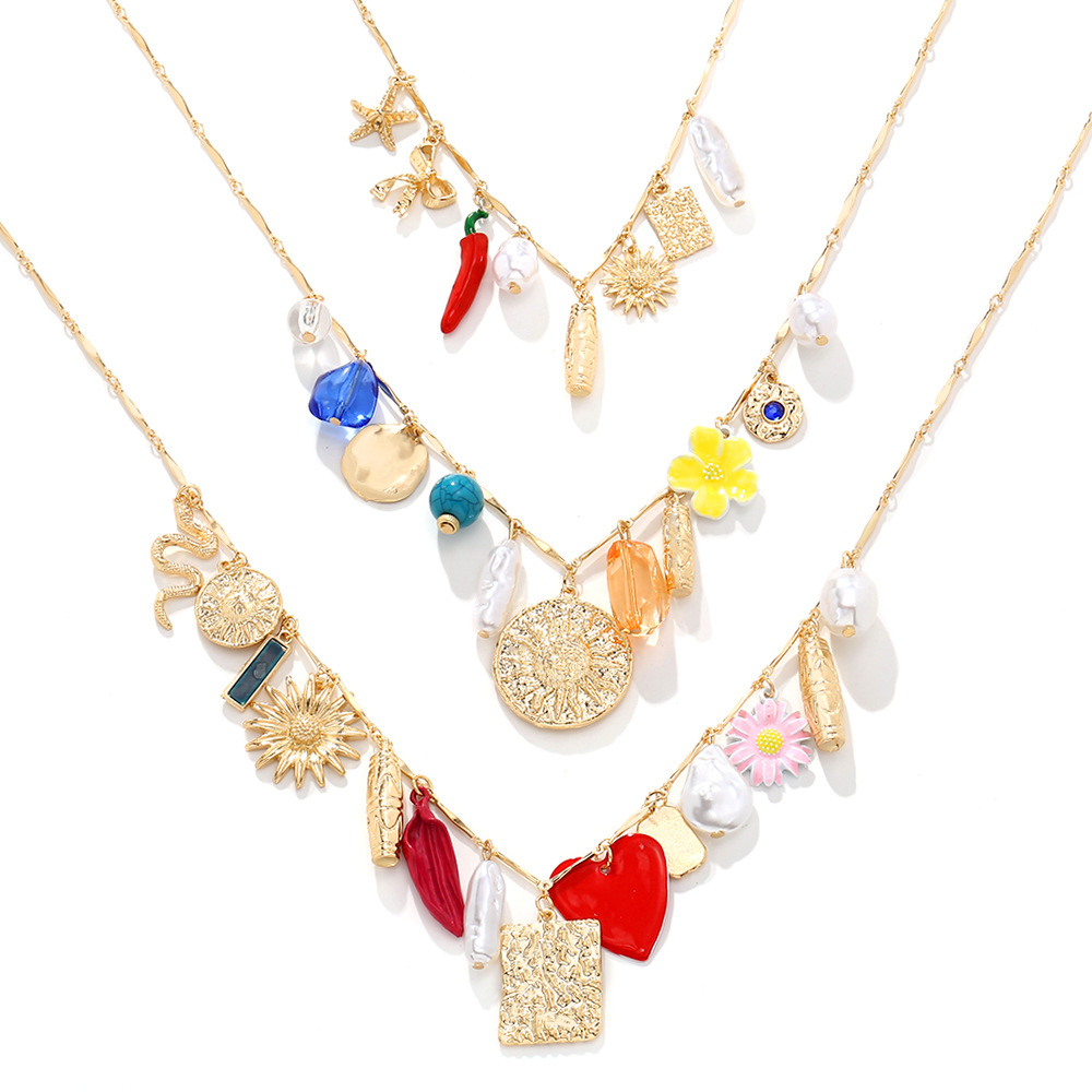 Collar multicapa serpiente corazón perla estilo europeo casual_voghion.com